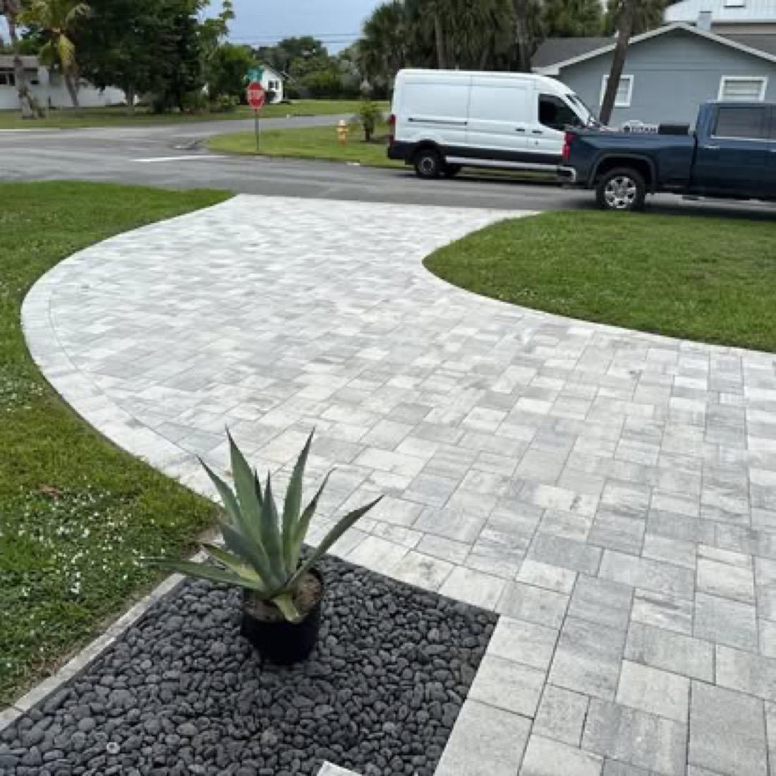 Curved paver front walkway with agave accent